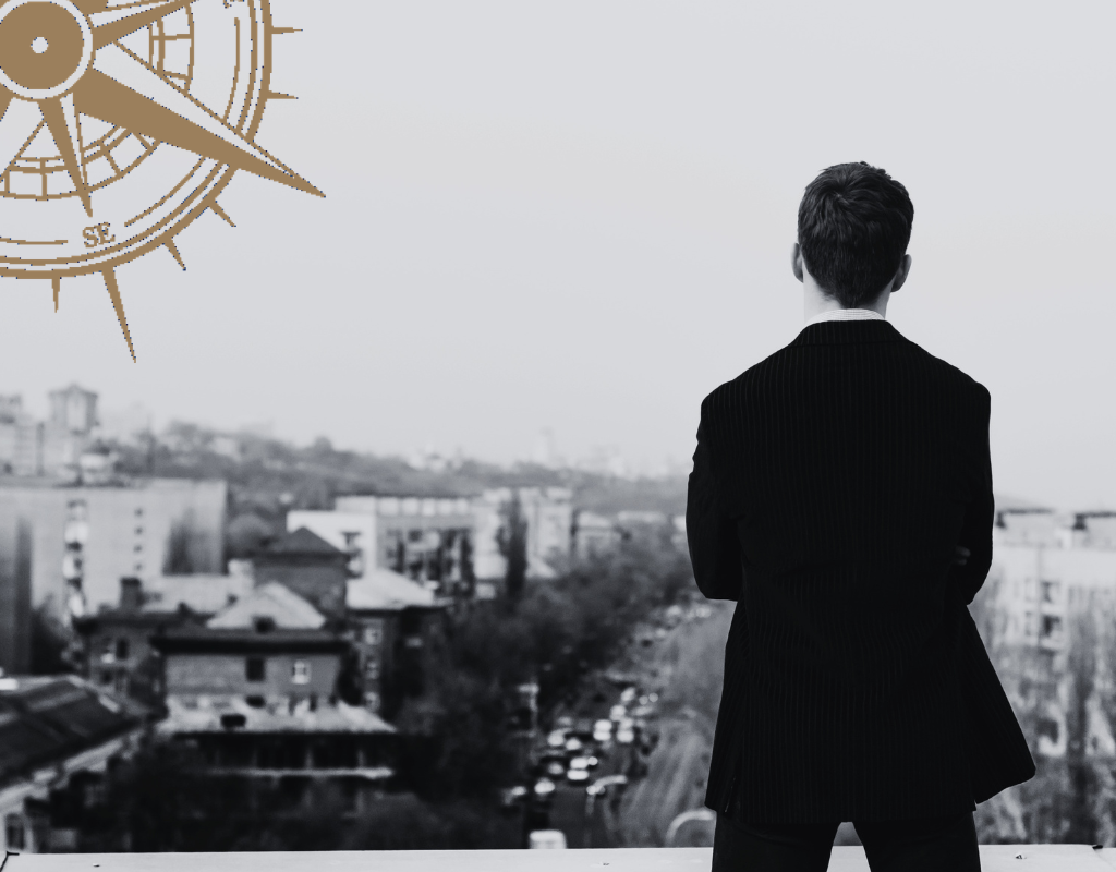 Loneliness at the top shown through a leader standing alone overlooking the city